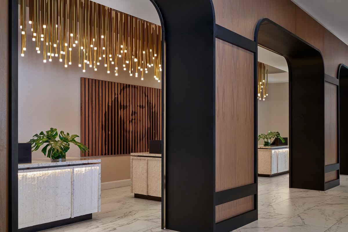 Custom hospitality art and branding installation in a luxury hotel lobby