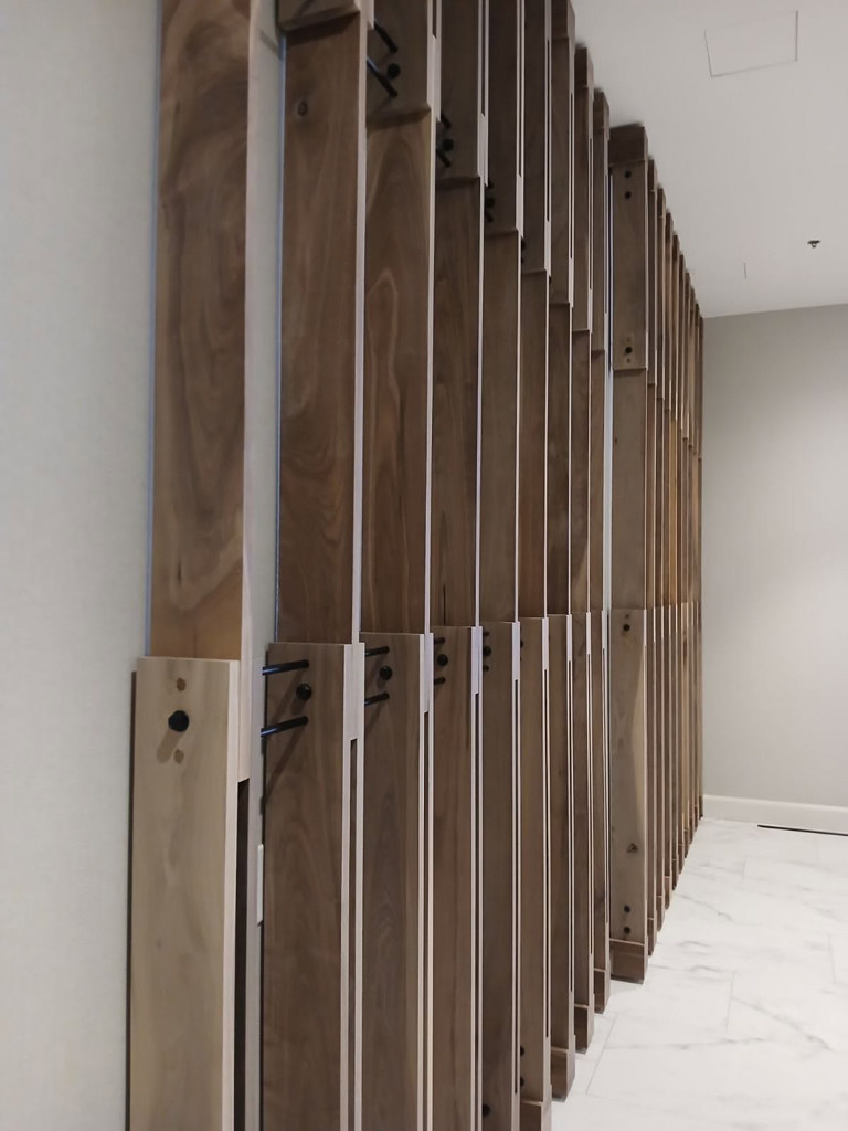Custom architectural branding feature wall installation